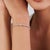 This modern tennis bracelet features 1.61 carats of aquamarine and diamond, set in 14k white gold. Each measuring...
