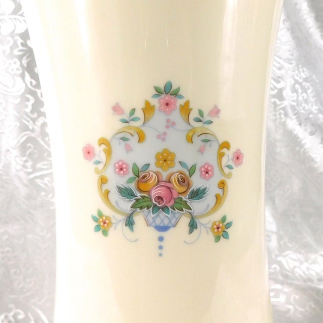 This is a nine inch vase by Royal Doulton in the Juliet pattern from 1982. The vase is white with a multicolor floral...