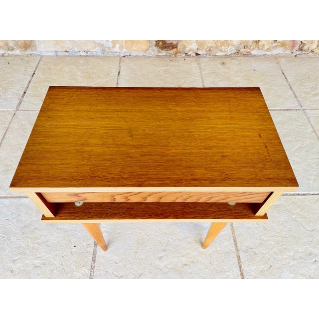 Mid century, vintage nightstand circa 60's/70's piece is made of wood with a veneer and varnish finish. bedside rest on...