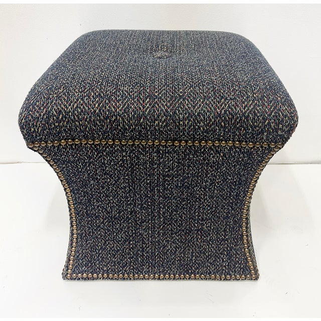 Cami Stools Ottomans Upholstered with Nail Head Trim, Pair Offered for sale is a pair of Cami ottomans or stools that are...