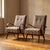 A pair of bentwood lounge armchairs designed by Jaroslav Šmídek, produced in Czechoslovakia. The chairs feature sculptural...