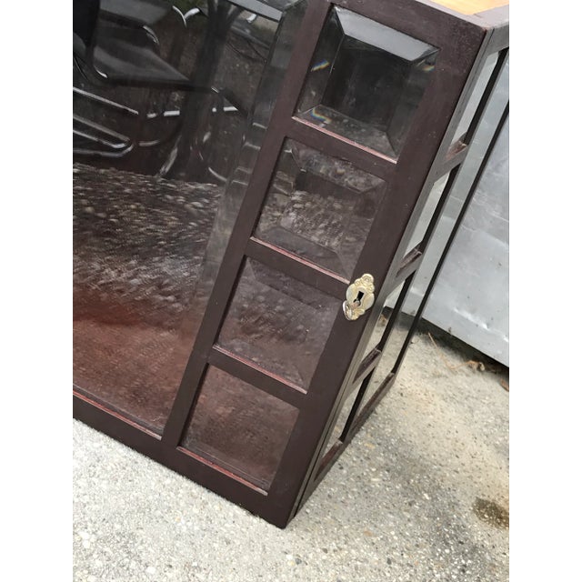 Brown cabinet. This vintage cabinet originates from Hungary. We maintained its brown patina color. It is ideal in the...
