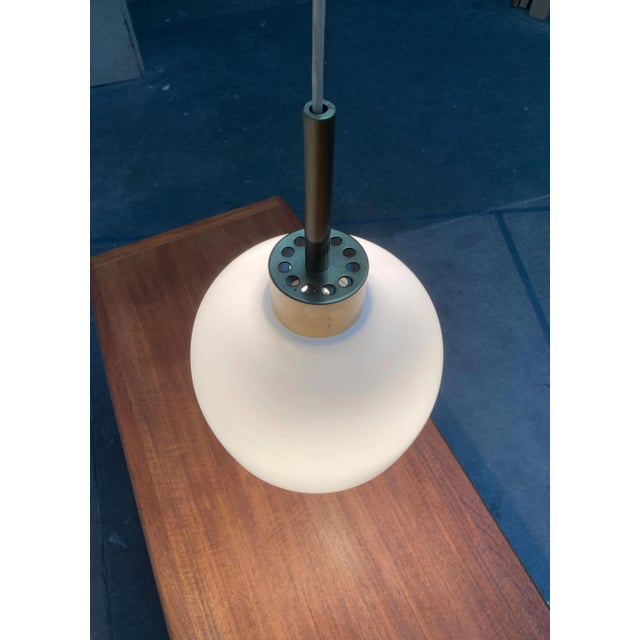 Mid-Century Danish Brass and Glass Pendant, in Very Good conditions. Designed 1960 to 1969 Up to 250V (Europe/UK...