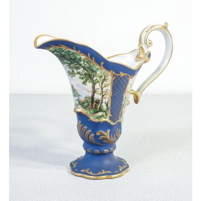 Hand-painted porcelain carafe with tray and saucers in louis xv style. Origin france period twentieth century materials...