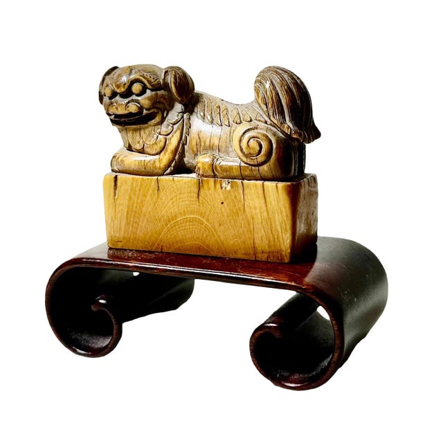 This is a very important piece. An antique fossilized foo dog with a custom wood stand. It is Ming dynasty. Name on the...