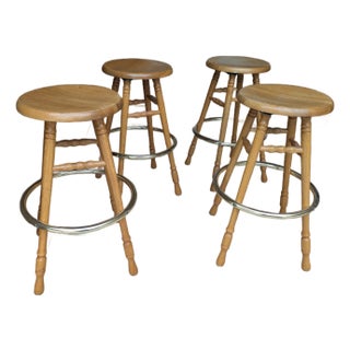 1980s Four (4) 30" Solid Oak Stools Brass Footrest For Sale