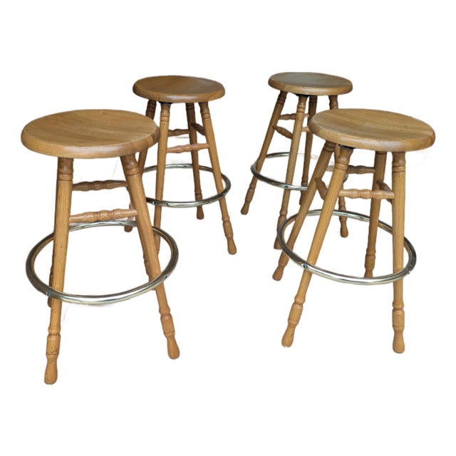 1980s Four (4) 30" Solid Oak Stools Brass Footrest For Sale