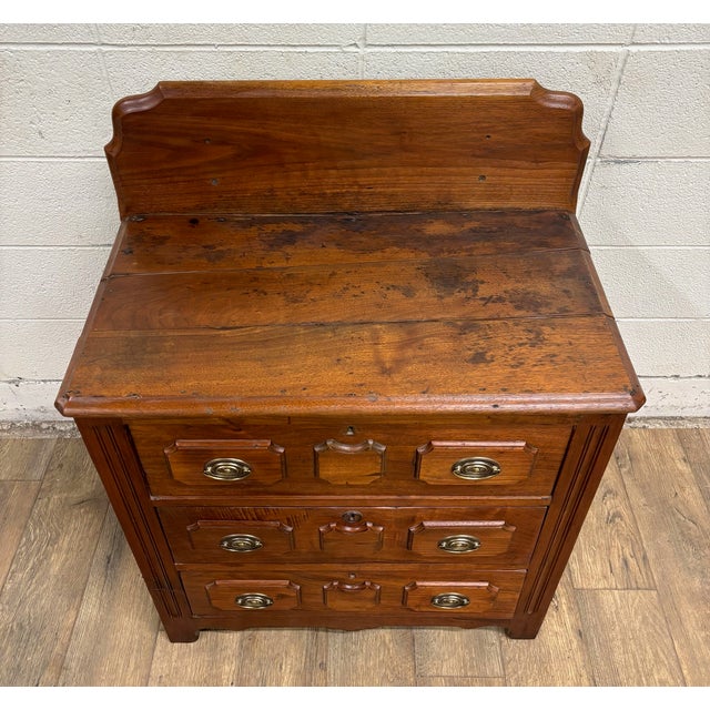 This is an absolutely gorgeous antique 19th Century Victorian carved washstand, small chest, or commode with beautiful...