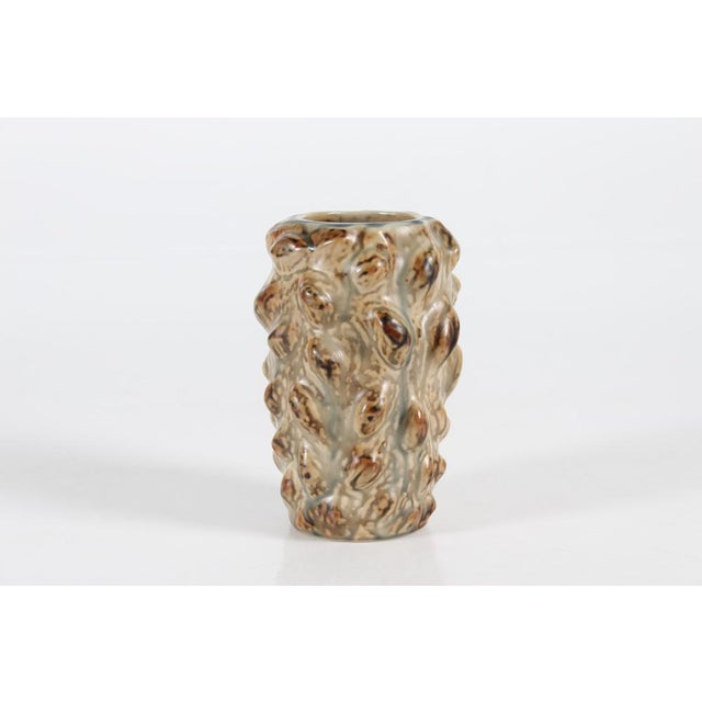 Axel Salto (1889-1961) for Royal Copenhagen Denmark Sculptural vase with modeled relief model no. 20701 was designed in...