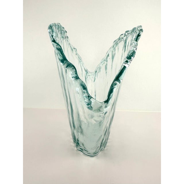 This exquisite piece seamlessly blends modern aesthetics with the fluid beauty of ocean waves. Crafted with precision and...