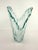 This exquisite piece seamlessly blends modern aesthetics with the fluid beauty of ocean waves. Crafted with precision and...