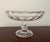 Antique crystal honeycomb pattern compote/comport has a scalloped edge and a pedestal base. It is 8" around and stands...