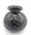 Offered is a "Barro Negro" (black mud) "Mata Ortiz" bud vase created by Jaime Dominguez, a Mexican artist known for his...