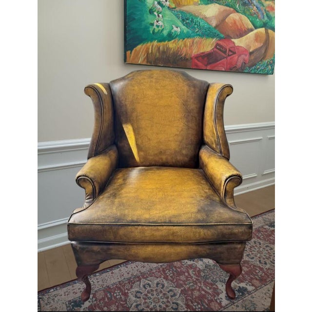 Elevate your space with this rare vintage wingback chair from the renowned Douglas Furniture company. A masterclass in...