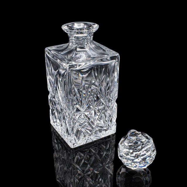 This is a vintage whisky decanter. An English, cut glass Scotch bottle, dating to the late 20th century, circa 1970. A...