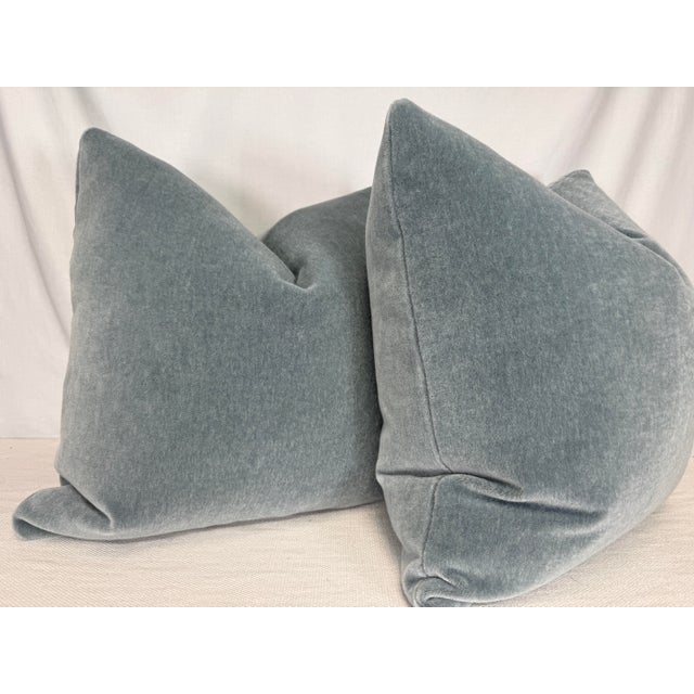 Custom pair of 22" pillows covered in JB Martin "Nevada Mohair" in color arctic blue. These pillows have tapered corners...
