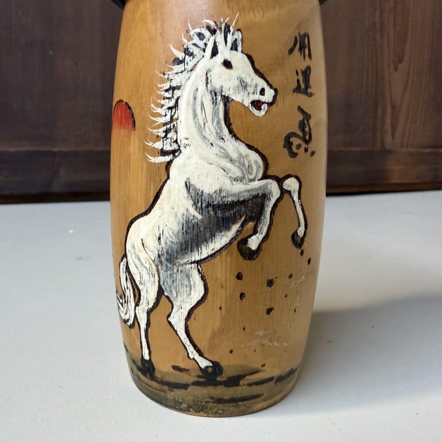 Vintage kokeshi by Okamoto Usaburo, titled “Kaiun Uma” — meaning “good-fortune horse”, a motif associated with prosperity,...