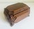 This wonderful American folk art box, an example of early 20th-century tramp art, includes an intricately chip-carved,...