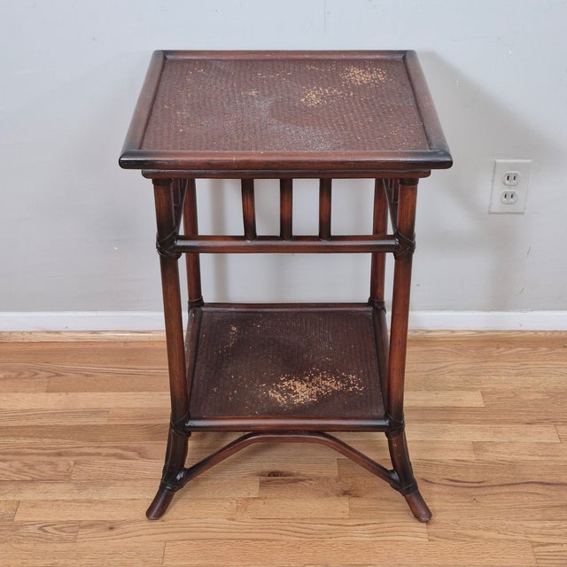 This is a British colonial style side table that measures 18” square and 26” tall. It's a handsome and useful little side...
