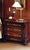 Handcrafted in Italy, this Louis XVI night stand features a warm walnut finish, hand-carved pilasters, and three drawers...