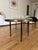 This stunning Arteriors Rein Brass Coffee Table is a sculptural, kidney-shaped designer piece that brings warmth, texture,...