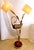 This is a rare Antonio Pavia brass and red lacquered wood stork floor lamp from the 1980s. This contemporary lamp features...