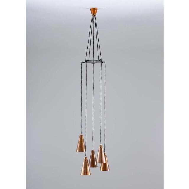 Wonderful early pendant in solid copper, attributed to Hans-Agne Jakobsson. This specific model we haven't found...