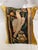This decorative pillow is upholstered with an authentic 18th-century tapestry, showcasing a beautifully detailed bird...