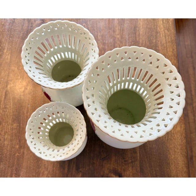 Add a touch of Victorian elegance to your home’s decor with this beautiful set of three vases that feature the “Victorian...