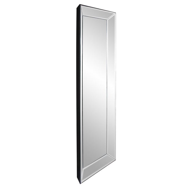 This striking piece features rectangular mirrored frame that is pitched, flaring away from the wall. Each mirrored section...