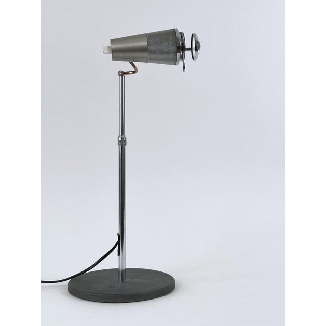 Extremely rare post-modern light projector or table lamp. Model 'galileo sistema'. Adjustable lamp shade and height. With...