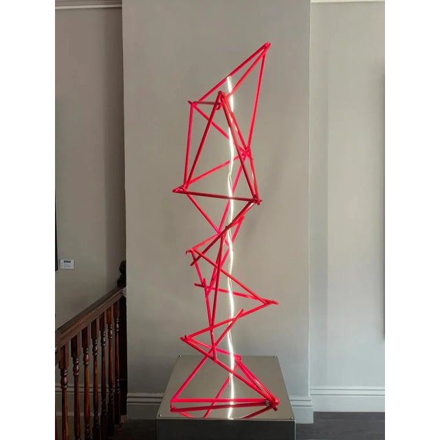 Mark Beattie, Fracture, 2024 Painted copper & LED rope light on mirror polished stainless steel plinth 60 x 60 x 225 cm...