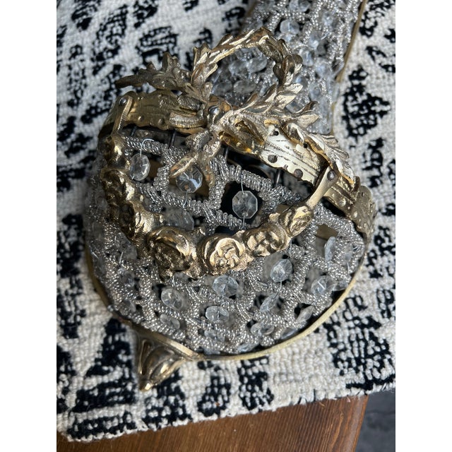 Up for consideration is a beautiful vintage pair of small gold French basket crystal sconces. These would look lovely in...