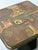 A striking pair of vintage side tables by kneip, featuring highly decorative mixed-media tops and contrasting dark...