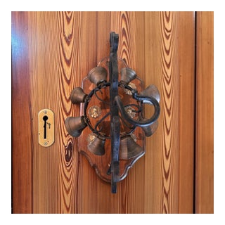 Vintage Wrought Iron & Brass 8-Bell Mechanical Door Bell on Wood Plaque For Sale