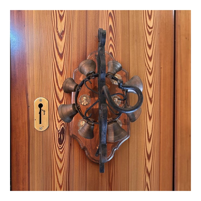 Vintage Wrought Iron & Brass 8-Bell Mechanical Door Bell on Wood Plaque For Sale