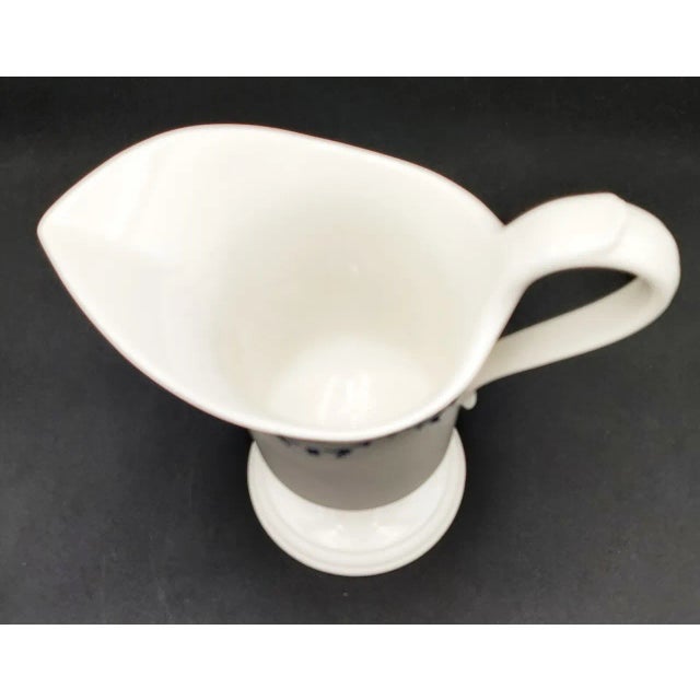Add timeless elegance to your table with this Villeroy & Boch Vieux Septfontaines carafe pitcher. Crafted from fine...