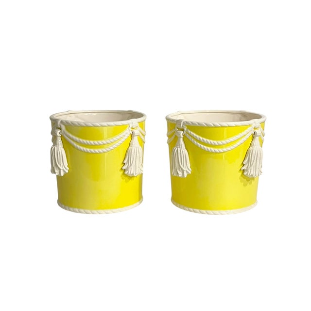 Add a cheerful burst of color and classic Hollywood Regency style with this charming pair of vintage Fitz & Floyd ceramic...