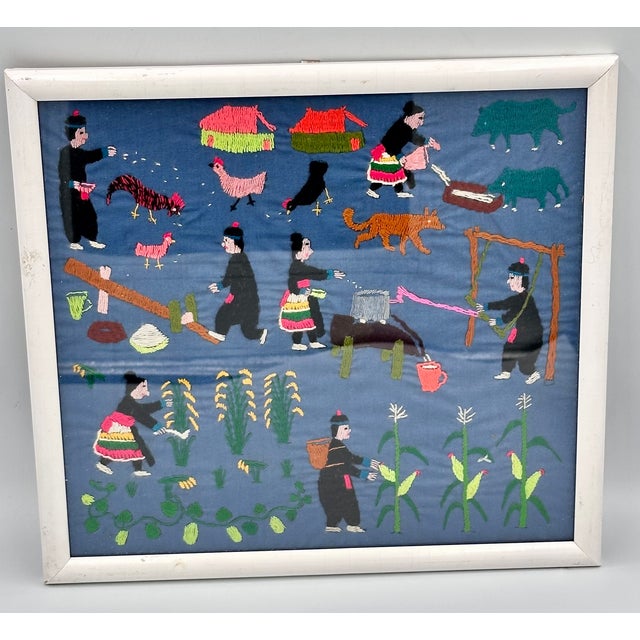 Step into a world of cultural storytelling with this captivating vintage Hmong 'Paj Ntaub Dab Neeg' story cloth....
