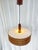 A beautifully designed pendant light, likely from the 1960s or 1970s, from denmark. hand-woven teak slats with a beautiful...