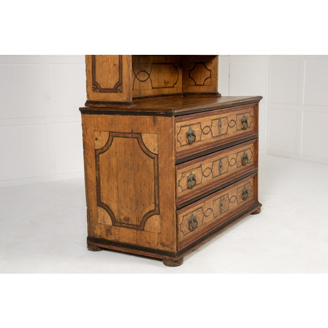 18th Century Pine Cabinet with Original Paint. This fine domed-top cabinet is of a form associated with workshops in...