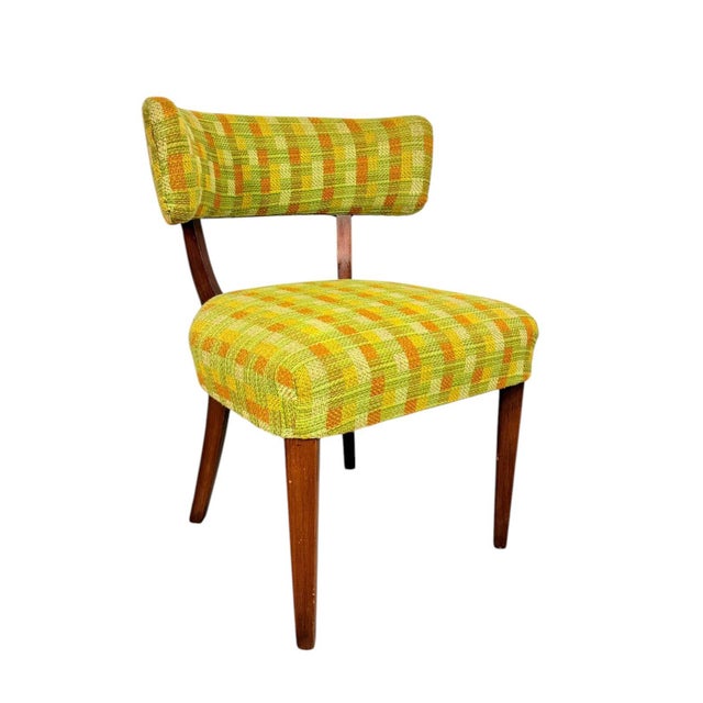 These mid-century modern walnut dining chairs feature a stunning curved backrest design that provides both comfort and a...