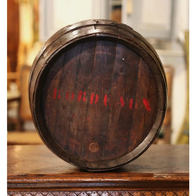 Decorate a wine cellar or a bar with this antique wine barrel. Created in the wine Bordeaux region of France, circa 1880,...
