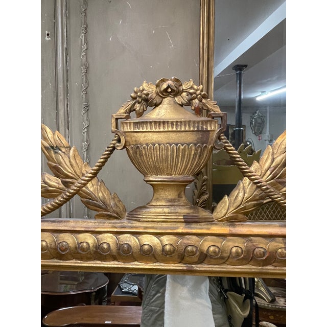 Magnificent rectangular gold mirror, adorned with moldings, in XL size.