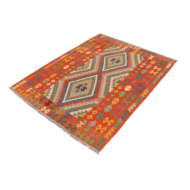 Add a touch of elegance to your home with this casual chic hand woven Tribal Kilim wool rug. Constructed on a loom by...