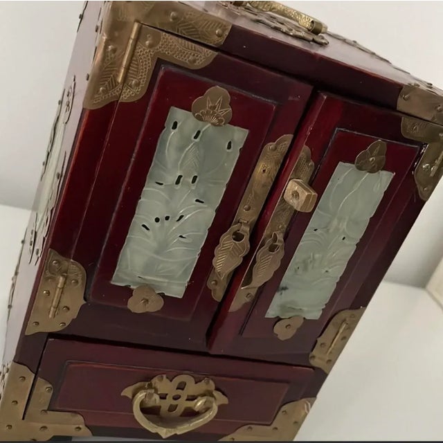 Beautiful vintage Chinese jewelry box Rosewood with inlaid carved white jade with brass accents. 4 draws (all in working...