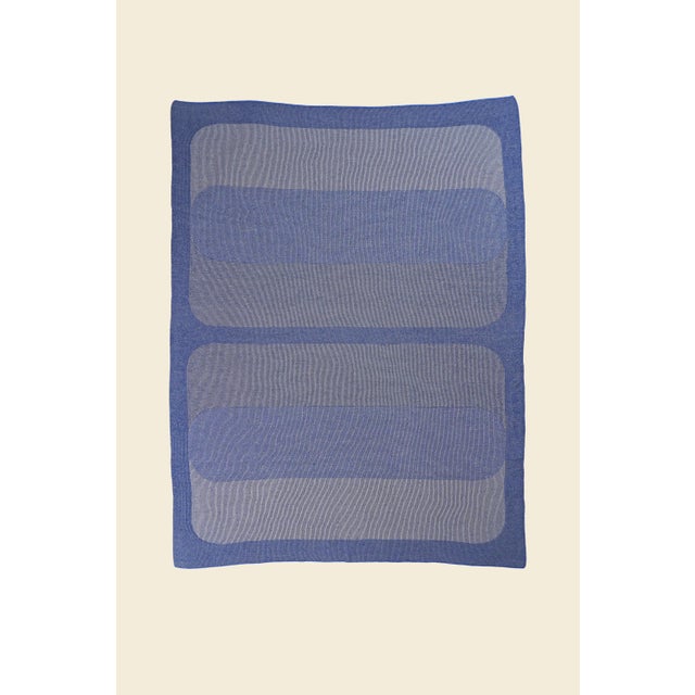 Soft, breathable, and designed to move effortlessly between seasons, this knitted blanket is made from a luxurious blend...