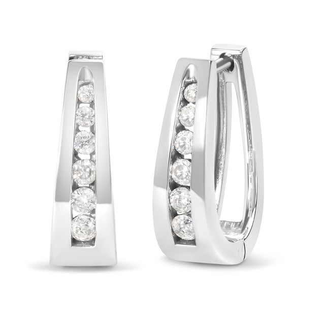 Fashioned in stunning 14k white gold, these beautiful hoop earrings feature 1/4ct of brilliant round cut diamonds in a...