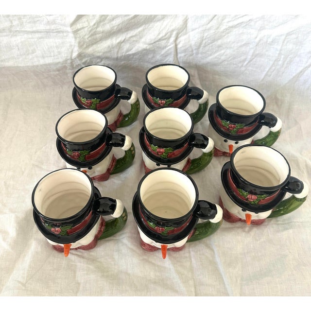 Vintage set of 8 Holiday Fitz & Floyd Snowman Mugs with a top hat and bow. Super cute to mix and match these with other...