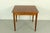 Elegant drop-leaf table stamped 1958, likely produced by Dutch design house Pastoe. with clean lines and a warm wood...